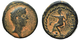 SYRIA, Coele-Syria. Damascus. Augustus. 27 BC – 14 AD. Ae (bronze, 7.10 g, 22 mm). Bare head right. Rev. Tyche seated left on rock, extending arm and ...