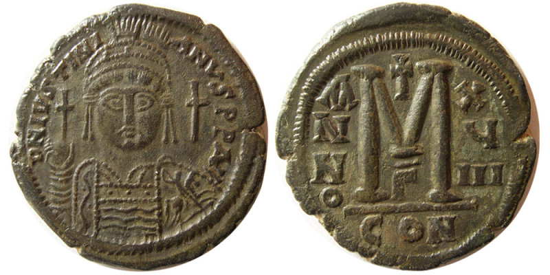 BYZANTINE EMPIRE; Justinian, 527-565 AD. Æ 40 Nummi (20.40 gm; 35 mm). Constanti...