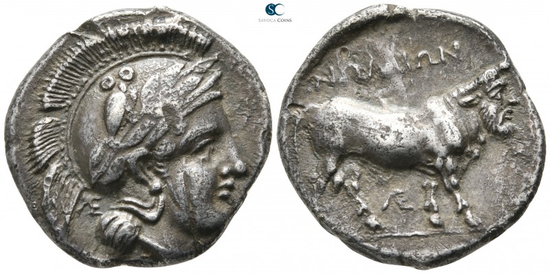 Campania. Nola 400-385 BC. 
Nomos AR

21 mm., 7,18 g.

Head of Athena to ri...