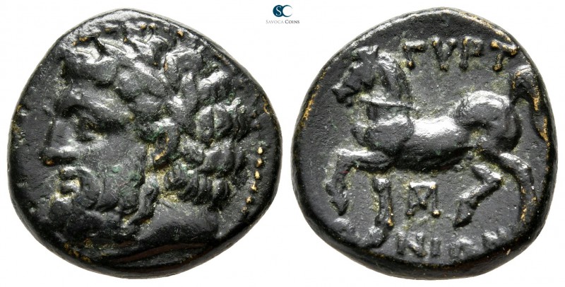 Thessaly. Gyrton circa 300 BC. 
Trichalkon Æ

20 mm., 8,19 g.

Laureate hea...