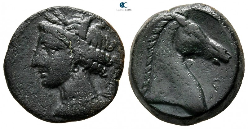 Zeugitania. Carthage 300-264 BC. 
Bronze Æ

18 mm., 5,25 g.

Wreathed head ...