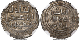 Great Mongols. Chingiz Khan Dirham ND (AH 603-624 / AD 1260-1227) AU58 NGC, Ghazna mint, A-1967. A stellar example of this rare silver Dirham type bea...