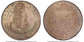 Leopold I Taler 1699 AU58 PCGS, Hall mint, KM1303.4, Dav-3245. Delicate cyan and amber hues caress both the peripheries and the portrait of this iconi...