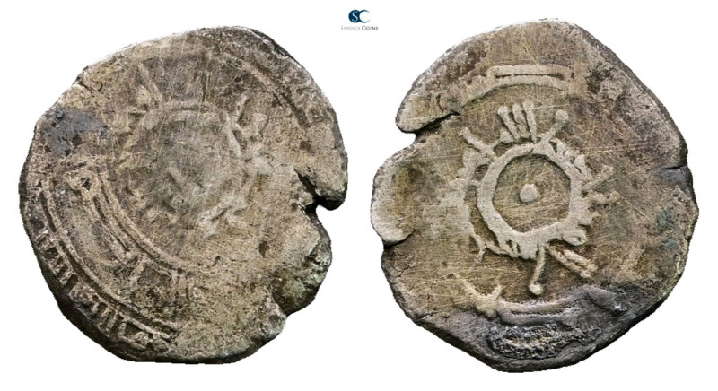 Fatimids. AH 296-567. 
AR 1/4 Dirham 

16 mm, 0,92 g



Good Fine