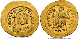 Maurice Tiberius (AD 582-602). AV solidus (21mm, 4.47 gm, 7h). NGC Choice AU 5/5 - 2/5, light graffito. Constantinople, 3rd officina, AD 583-601. o N ...