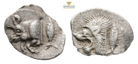 MYSIA, Kyzikos. 525-475 BC. AR obol (10,5 mm, 0.39 g). Forepart of boar, tunny-fish behind / Head of lion in shallow incuse square.