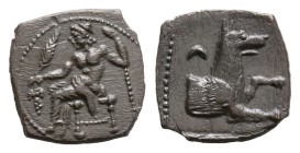 "Lycaonia, Laranda AR Obol 4th century BC 0.45 g. 9,7 mm.
Baaltars seated left, holding grain ear, grapes and sceptre.
Rev. Forepart of wolf right; ...