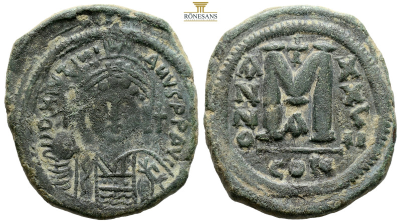 JUSTINIAN I, 527-565. AE Follis, Constantinople (16,9 g. 33,6 mm.)
Helmeted and ...