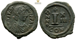 Justinian I, Æ, Decanummium. Constantinople. AD. 527-565 5,3 g. 24,7 mm.
DNIVSTINI-ANVSPPAVC. Bust of Justinian I facing right with diadem, cuirass an...