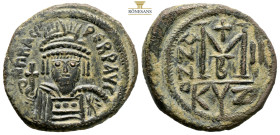 HERACLIUS, 610-641 AD. AE, Follis. Constantinople. 12,4 g. 30,5 mm.
Obv: [D N hERA]CLI PERP AVG. Draped and cuirassed bust of Heraclius facing, with s...