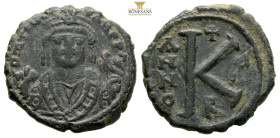 Maurice Tiberius. 582-602. Æ half follis (22.8 mm, 5.9 g, ) Antioch mint, wearing crown with trefoil ornament, and consular robes; in right hand, mapp...