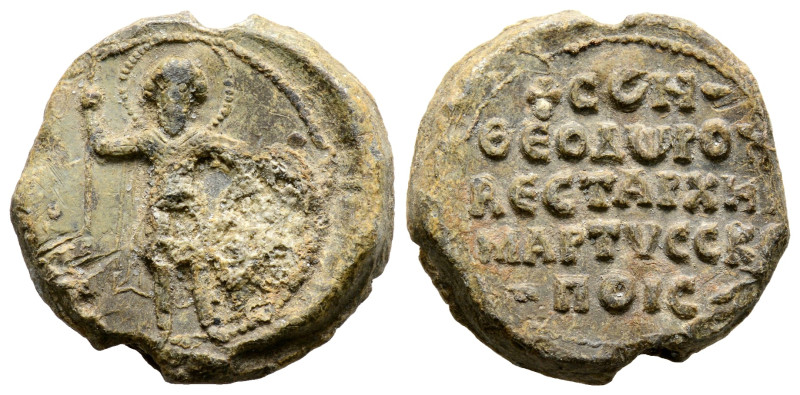 Byzantine Coins
BYZANTINE LEAD SEAL.
Obv: St. Theodore standing facing, holding ...