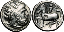 Celtic World. Celtic, Danubian Region. AR Tetradrachm, imitating Philip II of Macedon, 3rd cent. BC. D/ Laureate head of Zeus with crude features righ...