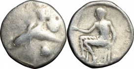 Greek Italy. Southern Apulia, Tarentum. AR Nomos, c. 470-425 BC. D/ Phalantos riding dolphin left; below, shell. R/ Oecist seated left, holding distaf...
