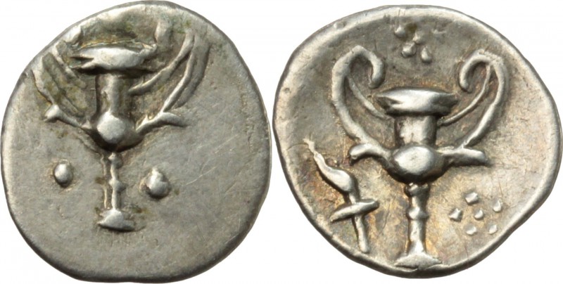 Greek Italy. Southern Apulia, Tarentum. AR Obol, c. 280-228 BC. D/ Kantharos. R/...