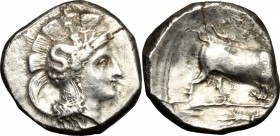 Greek Italy. Southern Lucania, Thurium. AR Stater, c. 300-280 BC. D/ Head of Athena right, wearing crested Attic helmet decorated with Scylla. R/ Bull...