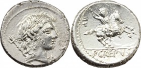 Pub. Crepusius. AR Denarius, 82 BC. D/ Laureate head of Apollo right, sceptre over shoulder; behind, uncertain letter; below chin, uncertain letter. R...
