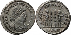 Constantine II as Caesar (317-337). AE Follis, Treveri mint. D/ CONSTANTINVS IVN NOB C. Laureate and cuirassed bust right. R/ GLORIA EXERCITVS. Two so...