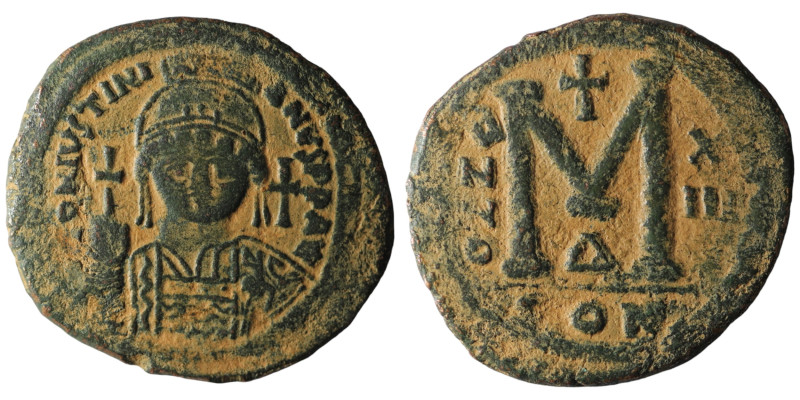 Justinian I. (527-565 AD) Æ Follis. Constantinople. Obv: crowned bust facing hol...