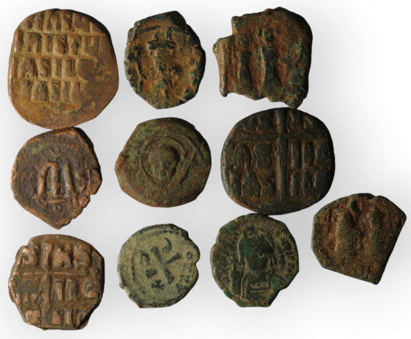 Lot of 10 byzantine bronze coins. artifcial sandpatina. sold as seen, no return.