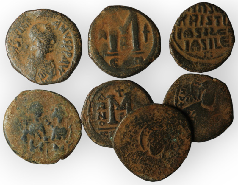 Lot of 7 byzantine bronze coins. artifcial sandpatina. sold as seen, no return.