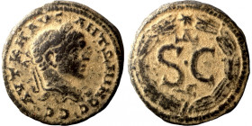 Elagabalus, 218-222. Radiate head of Elagabalus to right. Rev. S C; Δ - E above, eagle with open wings below; all within laurel wreath with star at th...