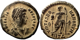Gratian, 367-383. Follis. Antioch. D N GRATI-ANVS AVG Diademed, draped and cuirassed bust of Gratian right. Rev. Roma seated facing, holding globe in ...