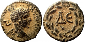 Elagabalus. (218-222 AD). Æ Bronze. Syria. Antioch. Obv: bust of Elagabalus right. Rev: delta in wreath. 
20mm 5,59g
Artificial sand patina