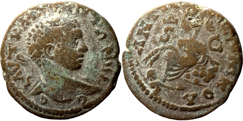 Trajan, 98-117. Ae Laureate head right. Rev. Baetyl of Zeus Kasios within tetras...