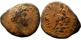 Marcus Aurelius (?), as Caesar, 139-161. Ae Bare-headed, draped and cuirassed bust right. Rev. Zeus seated left, holding long sceptre. 
21mm 9,10g
A...
