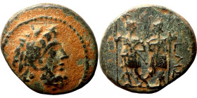 COELE-SYRIA. Chalkis ad Libanon. Ptolemaios. Tetrarch, circa 85-40 BC. Ae (bronze, 6.25 g, 20 mm). Dated Laureate head of Zeus right. Rev. The Dioskou...