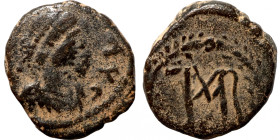 Anthemius, 467-472. Ae (bronze, 1.21 g, 12 mm), Rome. Pearl-diademed, draped and cuirassed bust right. Rev. Monogram within wreath. RIC X 2857. Good f...