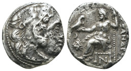 Macedonia. Alexander the Great. (336-323 BC) AR Drachm. Obv: head of Alexander the great right. Rev: sitting Zeus holding eagle and scepter. Weight 3,...