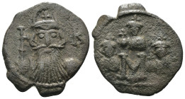 Constans II. (641-668 AD). Æ Follis. Constantinople. Obv: bust of Constans facing holding globus cruciger. Rev: M ; Constantine IV., Heraclius and Tib...