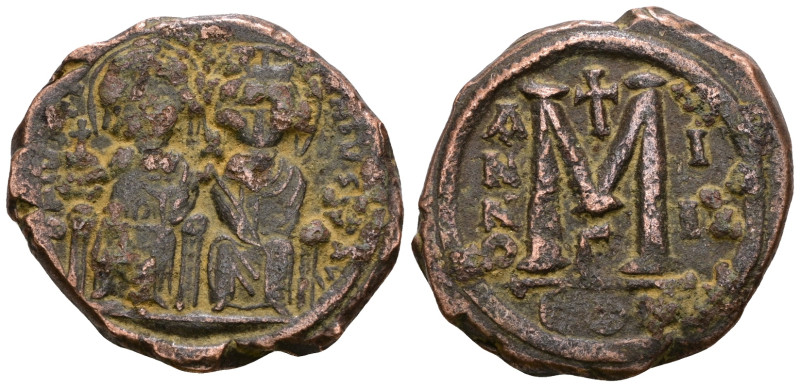 Justin II AE Follis, 572/3 Justin II , with Sophia (565-578 AD). AE Follis. Weig...