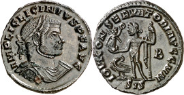(313 d.C.). Licinio padre. Siscia. Follis. (Spink 15249) (Co. 123) (RIC. 234a). Anv.: IMP. LIC. LICINIVS P. F. AVG. Su busto laureado, drapeado y acor...