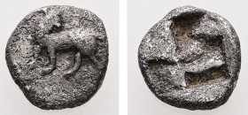 Thraco-Macedonian Region, uncertain. AR Obol. 0.58 g. - 8.28 mm. c. 500-480 BC.
Obv.: Bull standing left, head turned back to right. 
Rev.: Quadripart...