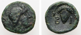 Thrace, Bisanthe. AE. 1.49 g. - 11.66 mm. ca. 300-200 BC.
Obv.: Head of Dionysos to right, wearing ivy wreath.
Rev.: Β-Ι. Vine branch with bunches of ...