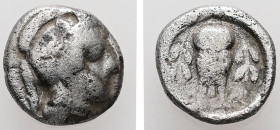 Attica, Athens. AR, Hemidrachm. 1.92 g. - 12.37 mm. Circa 454-404 BC.
Obv.: Helmeted head of Athena right, with frontal eye.
Rev.: [A - Θ – Ε]. Owl st...