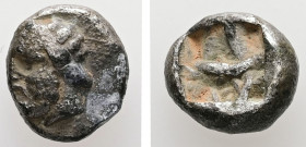 Asia Minor, uncertain. AR, Diobol. 1.17 g. - 10.38 mm.
Obv.: Bearded male head to left, wearing tainia.
Rev.: Divided incuse punch.
Ref.: -.; Apparent...