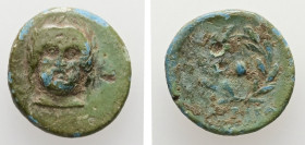 Aeolis, Autokane. AE. 1.49 g. - 13.42 mm. ca. 4th century BC.
Obv.: Laureate head of Zeus facing.
Rev.: AYTOKA. Barley grain within wreath.
Ref.: SNG ...