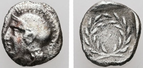 Aeolis, Elaia. AR, Diobol. 0.90 g. - 10.40 mm. Circa 450-400 BC.
Obv.: Head of Athena in crested Attic helmet to left.
Rev.: Ε-Λ. Olive wreath tied be...