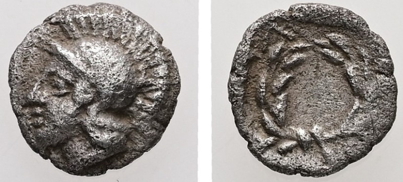 Aeolis, Elaia. AR, Hemiobol. 0.43 g. - 8.29 mm. Circa 450-400 BC.
Obv.: Helmeted...