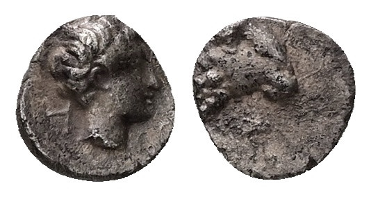 Caria, Kasolaba. AR, Hemiobol. 0.38 g. - 7.65 mm. 4th century BC.
Obv.: Young ma...