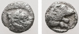 Caria, Uncertain. AR, Tetartemorion. 0.22 g. - 5.45 mm. ca. 4th century BC.
Obv.: Ram’s head right.
Rev.: Forepart of lion right within incuse square....