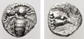 Ionia, Ephesos. AR, Tetartemorion. 0.21 g. - 5.84 mm. Circa 500-420 BC.
Obv.: Bee with slightly curved wings; annulet to left and right.
Rev.: [Ε Φ], ...