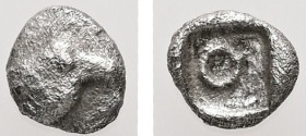Ionia, Magnesia ad Maeandrum (?). AR, Tetartemorion. 0.15 g. - 5.38 mm. ca. 500-464 BC.
Obv.: Head of an eagle to right.
Rev.: ΘΜ monogram within incu...