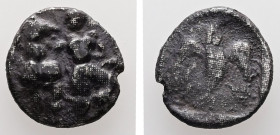 Ionia, Magnesia ad Maeandrum. ca. 465-400 BC. AR, Trihemiobol. 1.01 g. - 12.33 mm.
Obv.: Male figure standing front, head to left, leading with his ri...