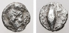 Ionia, Magnesia ad Maeandrum. Themistokles, ca. 465-459 BC. AR, Hemiobol. 0.31 g. - 6.75 mm.
Obv.: Youthful male (Apollo?) head right; wearing taenia,...