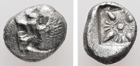 Ionia, Miletos. AR, Obol or Hemihekte. 1.15 g. - 9.62 mm. Late 6th-early 5th centuries BC.
Obv.: Forepart of lion right, head left.
Rev.: Stellate flo...